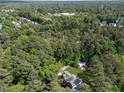 An aerial view showcasing the home's lush surroundings and neighborhood at 120 Harmony Hill Ln, Cary, NC 27513