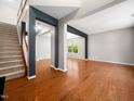 Spacious living room featuring hardwood floors, open layout, and neutral paint tones for a modern feel at 1719 Willowcrest Rd, Durham, NC 27703