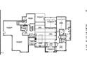 Detailed floor plan showcasing layout with multiple bedrooms, kitchen, and garage at 33 Versailles Ln, Pittsboro, NC 27312