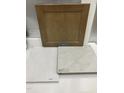 Interior finishes include taupe cabinets with light quartz countertops and white tile flooring at 348 Chesapeak Commons St # 137, Garner, NC 27529
