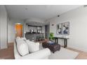 Open-concept living area with kitchen, comfortable seating, and stylish decor at 618 N Boylan Ave # 810, Raleigh, NC 27603