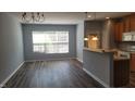 Open floor plan combining living and kitchen area at 958 Shining Wire Way, Morrisville, NC 27560
