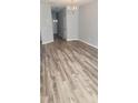 Spacious living room features hardwood floors and ample natural light at 958 Shining Wire Way, Morrisville, NC 27560