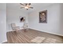 Comfortable living space with ceiling fan, wood floors, and neutral decor at 316 Alice Trace Place, Angier, NC 27501