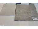 Selection of neutral-toned floor tiles with subtle textures and patterns at 368 Chesapeak Commons St # 132, Garner, NC 27529