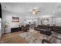 Spacious living room area showcasing recessed lighting, an open floor plan, and wood floors at 412 Kavanaugh Rd, Wake Forest, NC 27587