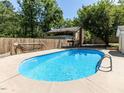 Private backyard with an in-ground pool, perfect for outdoor relaxation and entertainment at 525 Turtle Creek Farm Rd, Apex, NC 27523
