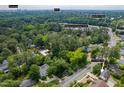 An aerial shot showing the neighborhood location of the home near downtown and local colleges at 1313 Ridge Rd, Raleigh, NC 27607