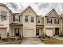 Charming townhomes featuring a private garage, complemented by well-maintained landscaping at 3623 Landshire View Ln, Raleigh, NC 27616
