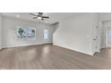 Bright living room with wood floors, white walls, and lots of natural light at 1009 Rhino Bnd, Oxford, NC 27565