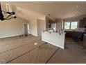 Well-lit kitchen featuring a convenient breakfast bar, modern appliances, and sleek countertops, great for entertaining at 112 Royal Ave, Selma, NC 27576