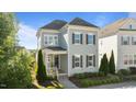 Charming two-story home featuring gray siding, dark shutters, and a landscaped front yard at 1641 Silo Ridge Dr, Wake Forest, NC 27587