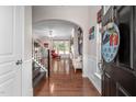 Inviting foyer with hardwood floors leading to an open-concept living space at 1908 Woodsdale Dr, Durham, NC 27703