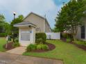 Well-maintained community mailboxes surrounded by lush landscaping and manicured lawns at 3339 Archdale Dr, Raleigh, NC 27614