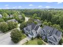 Birds eye view of homes surrounded by lush greenery at 401 Clingstone Ct, Cary, NC 27519