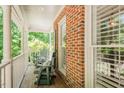 Relaxing front porch with rocking chairs, perfect for enjoying the outdoors at 5601 Jomali Dr, Durham, NC 27705