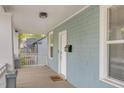 A view of the front porch with light blue siding and an inviting entrance at 610 N Driver St, Durham, NC 27703