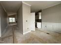 Spacious living room with a vaulted ceiling, fireplace, and trim work, bathed in natural light at 94 Royal Ave, Selma, NC 27576