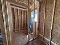 View of the interior framing in the closet with a window at 13159 S Nc-231 Hwy, Middlesex, NC 27557