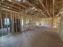 Open-concept living room displaying exposed framing, subfloor and ductwork at 13159 S Nc-231 Hwy, Middlesex, NC 27557