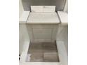 Interior material selection featuring white countertops, front line tile, and wood look flooring at 351 Chesapeake Cmns St # 111, Garner, NC 27529