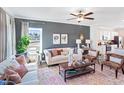 Comfortable living room with a view of kitchen, showcasing modern decor and a cozy atmosphere at 366 Bunker Hill Place, Angier, NC 27501