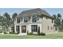 Two-story home featuring classic architecture, balanced landscaping and manicured yard at 4500 Latimer Rd, Raleigh, NC 27609
