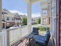 Cozy balcony with seating, providing a charming outdoor space to enjoy neighborhood views at 10529 Sablewood Dr # 116, Raleigh, NC 27617