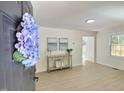 Bright living room with wood floors, neutral walls, stylish decor, and abundant natural light at 116 Lumpkin St, Raleigh, NC 27610