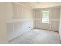 Unfinished bedroom featuring a window with natural light at 147 Gobbler Dr, Smithfield, NC 27577