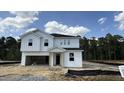Charming two-story home features a two-car garage and neutral paint at 147 Gobbler Dr, Smithfield, NC 27577