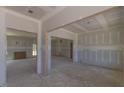 Spacious room featuring multiple entryways and ample natural light at 25 Sanders Farm Dr, Smithfield, NC 27577