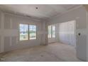 Living room with large window providing ample natural light at 25 Sanders Farm Dr, Smithfield, NC 27577