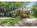 Charming home with landscaped front yard, walkway, and inviting entrance at 2823 Fowler Ave, Raleigh, NC 27607