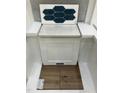 Showcasing interior design selections, including tile, cabinetry, flooring, and quartz countertop options at 339 Chesapeake Cmns St # 108, Garner, NC 27529