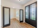 Spacious foyer with hardwood floors and frosted glass door at 48 Sanders Farm Dr, Smithfield, NC 27577