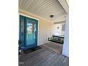 Relaxing front porch with a porch swing, ideal for enjoying outdoor living at 102 Kipling Dr, Oxford, NC 27565