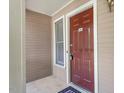Close-up of the unit's front door with a pleasing color, offering privacy and security at 111 Killam Ct # 2A, Cary, NC 27513