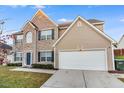 Attractive two-story home with a brick facade, attached two-car garage, and well-maintained landscaping at 2902 Framer Ln, Durham, NC 27704