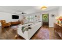Bright living room featuring hardwood floors, sectional sofa, and stylish decor at 4112 Huckleberry Dr, Raleigh, NC 27612