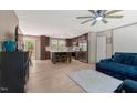 Cozy open-plan living area with a modern kitchen and comfortable seating at 6082 Zachary Lane Ln # 1S, Oxford, NC 27565