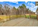 Expansive wooden deck overlooking the lush backyard, perfect for outdoor entertaining and relaxation at 9314 Turkey Way, Middlesex, NC 27557