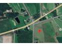 Aerial view reveals the property's location at the intersection of Parkertown Road and Parker Road at 1301 Parkertown Rd, Four Oaks, NC 27524