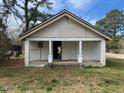 Front view of a white one-story home with a covered front porch and yard at 1400 Hargrove St, Rocky Mount, NC 27801