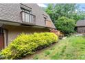 Brick and gray two story home with mature landscaping at 192 Summerwalk Cir, Chapel Hill, NC 27517