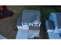 A bird's eye view of a home with a backyard and community playground nearby at 391 Curling Creek Dr Dr, Clayton, NC 27527