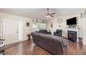 Cozy living room with fireplace and neutral paint, perfect for relaxation at 59 Long Grass Dr, Smithfield, NC 27577
