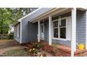 Charming home showcasing front porch, landscaping and brick pavers at 1100 Cardinals Knob, Rocky Mount, NC 27804