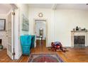 Spacious living room with hardwood floors, fireplace, and abundant natural light at 206 N State St, Raleigh, NC 27601