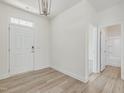 The entryway showcases wood-look floors and neutral paint at 504 Winding Creek Dr Dr, Lillington, NC 27546